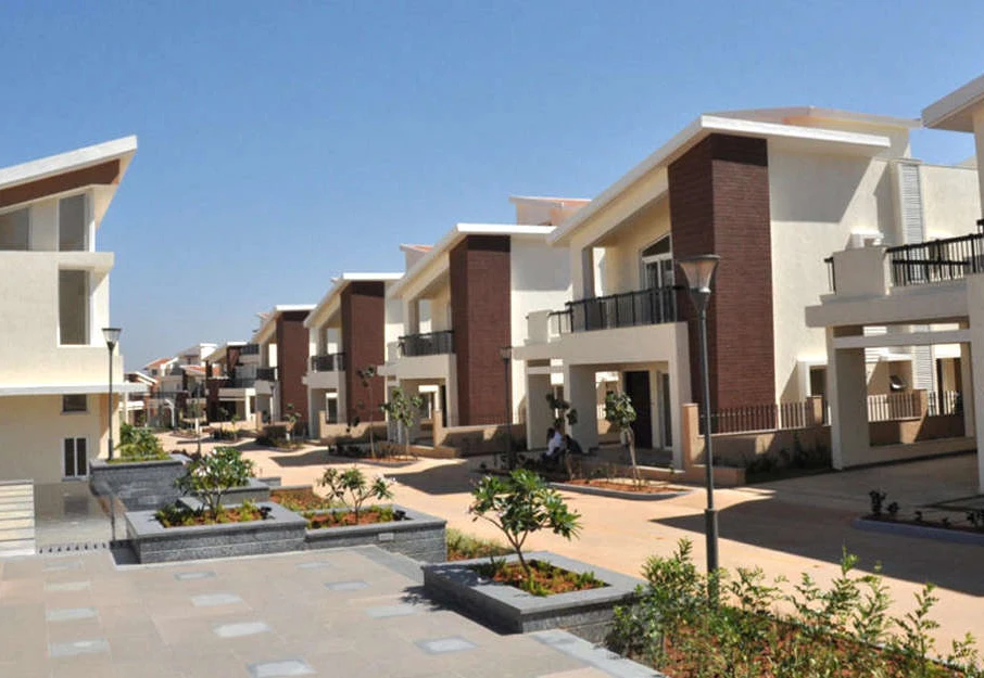 Contemporary independent villas around a paved landscaped courtyard at Prestige Mayberry in Bengaluru